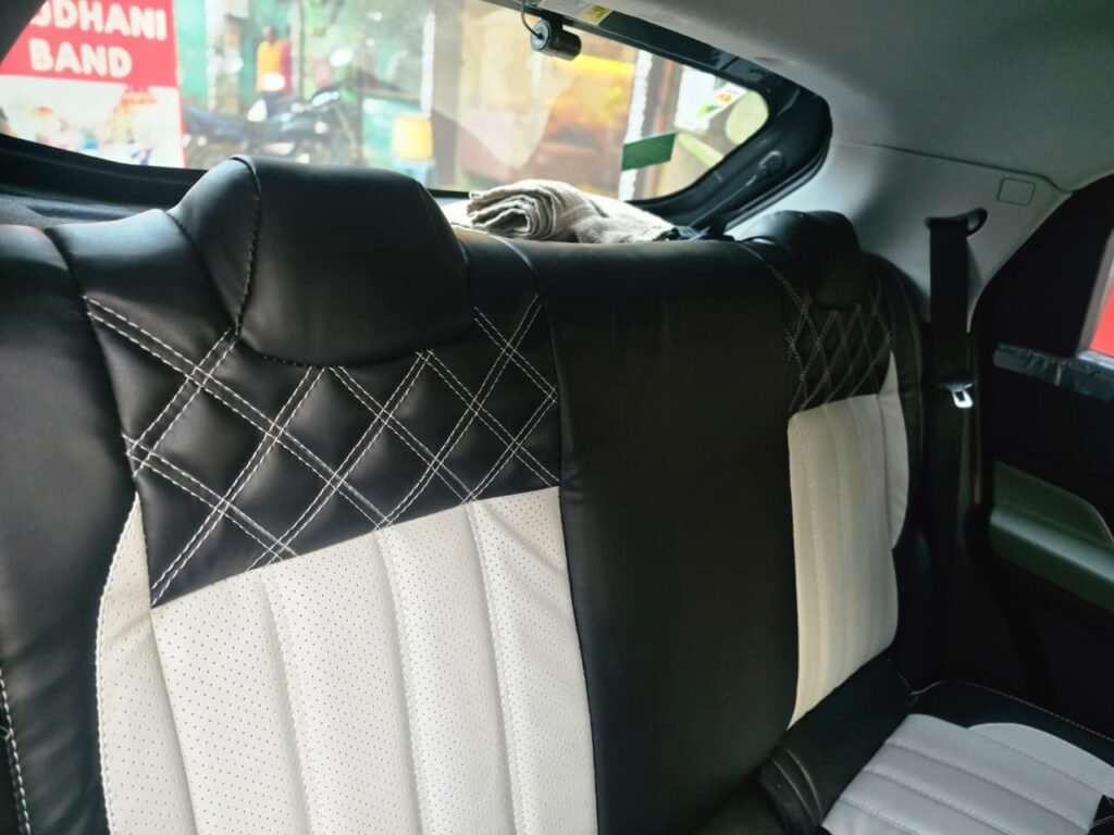 Apex Auto Industries India dwara design kiye gaye dual-tone custom seat covers, jo customer ki pasand ke mutabiq car ko ek modern aur sporty look dete hain."